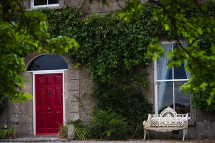 Front door and cast-iron Wexford bench